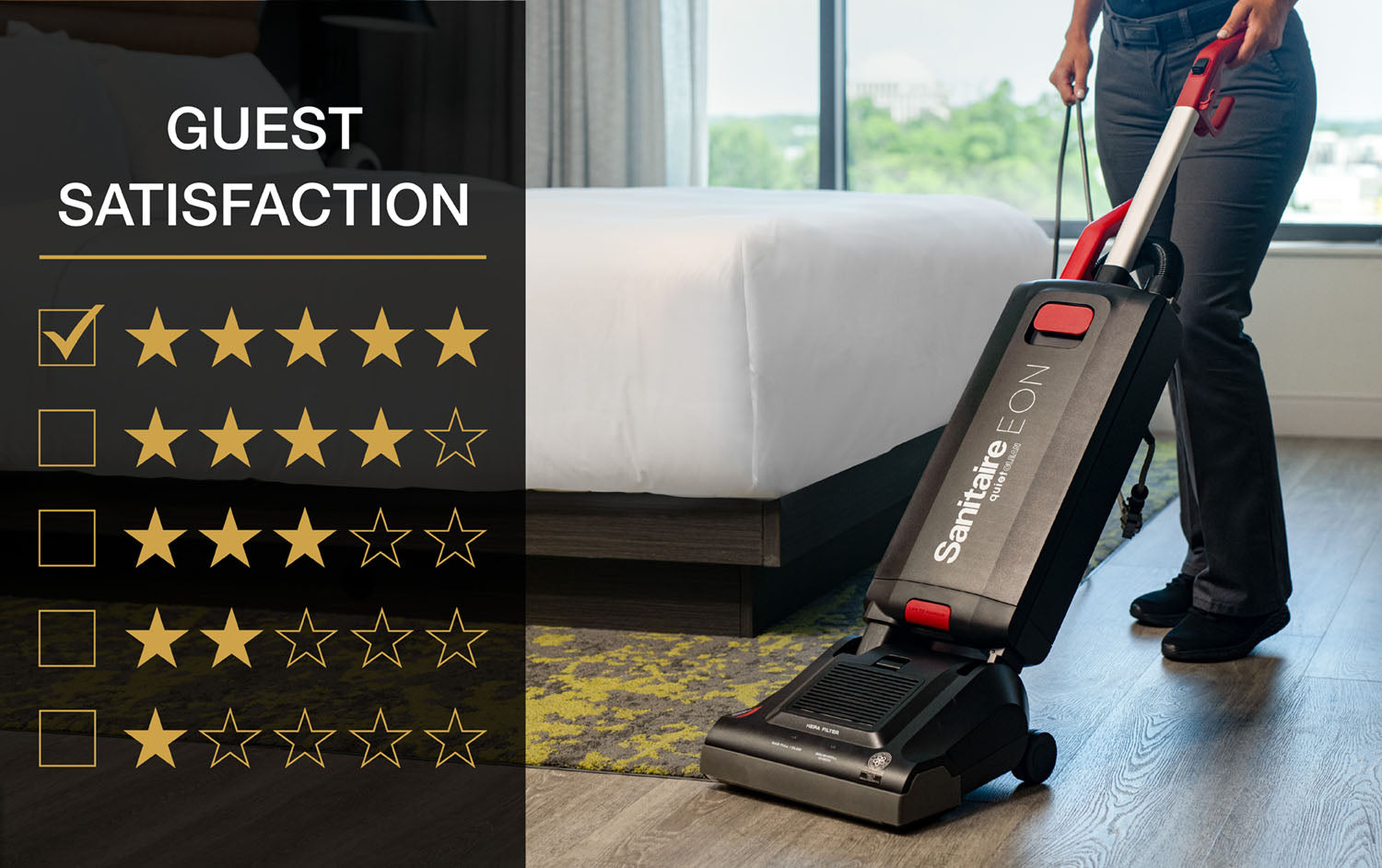 A hotel floor with both carpet and hard floor being cleaned by a housekeeper with a Sanitaire EON multi surface vacuum